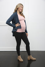 Load image into Gallery viewer, maternity leggings with belly support being shown with a cardigan. The goodbody goodmommy leggings. 
