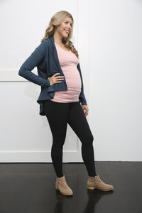 maternity leggings with belly support being shown with a cardigan. The goodbody goodmommy leggings. 