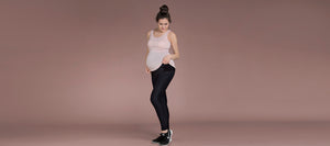 a wide shot of the goodbody goodmommy maternity activewear collection. Maternity leggings with a supportive belt.